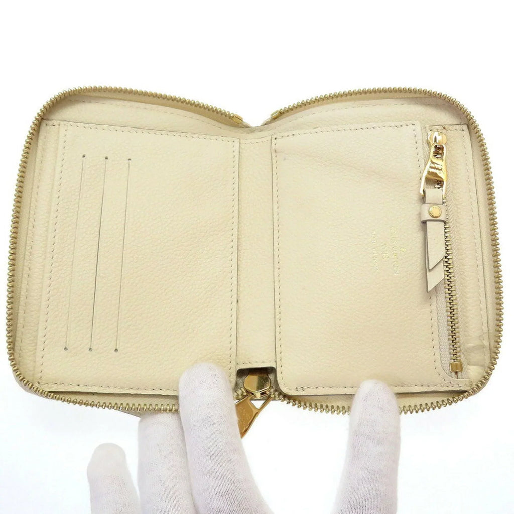Pre-Owned Louis Vuitton Monogram Implant Portefeuille Secret M93432 Neige Bifold Wallet Round (Good) - Exclusive Design